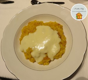 Risotto zucca e pancetta con fonduta di taleggio