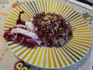 Risotto radicchio, pinoli e prosciutto crudo
